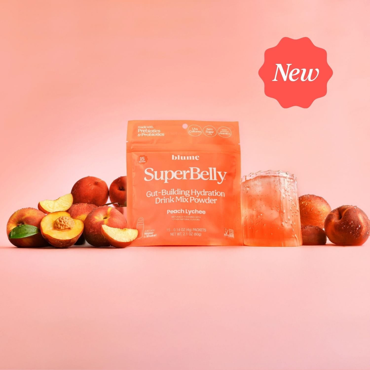 Blume SuperBelly Peach Lychee Gut-Building Hydration Powder package with peaches on a pink background