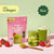Blume Strawberry Matcha Superfood Powder package with an iced and hot matcha latte, spoon, and strawberries on a pink surface.